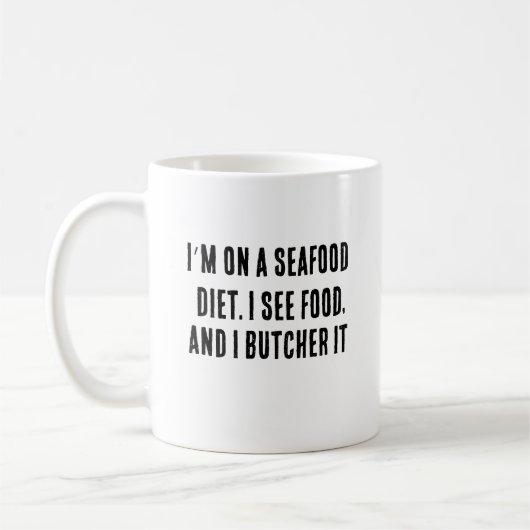 Ich bin auf Meeresfrüchte-Diät. Ich sehe Essen und Kaffeetasse (Links)