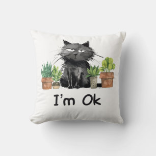 Ich bin eine lustige schwarze Katze mit Pflanze Kissen
