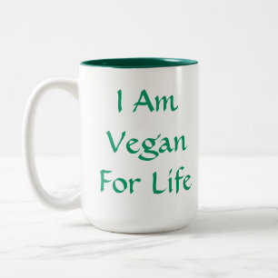 Ich bin für das Leben vegan. Grün. Slogan. Zweifarbige Tasse