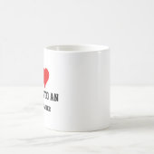 Ich gehöre zu einem Sporttrainer Kaffeetasse (Mittel)