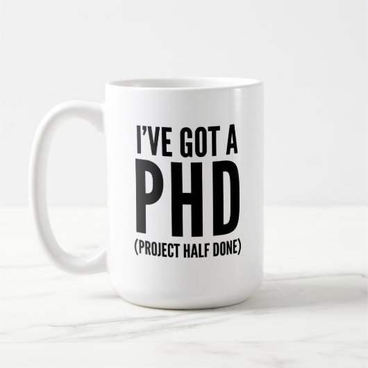 Ich habe einen PHD Got (Projekt halb fertig) Kaffeetasse (Links)