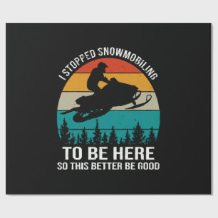 Ich hörte auf, mit Schneemobilen zu fahren, um hie Geschenkpapier