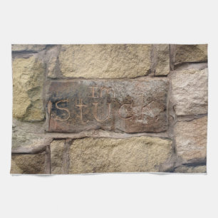 "Ich stecke fest" ein anderer Stein in der Wand Geschirrtuch