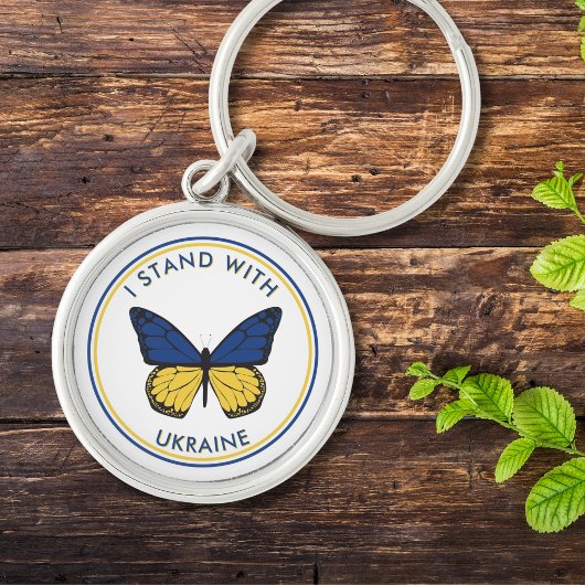 Ich stehe mit der Ukraine auf, die Schmetterlingsd Schlüsselanhänger