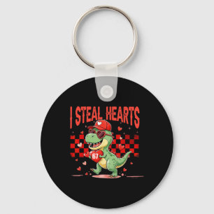 Ich stehle Herzen Valentinsjungen Dinosaurier hält Schlüsselanhänger