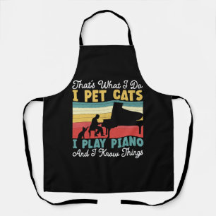 Ich streichle Katzen, ich spiele Klavier und ich w Schürze