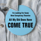 Ich suche nach neuen Verschwörungstheorien Button (Beispiel)