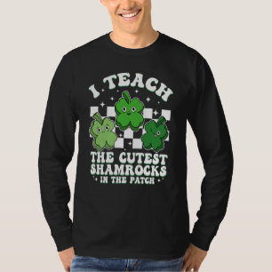 Ich unterrichte die süßesten Shamrocks Groovy Lehr T-Shirt