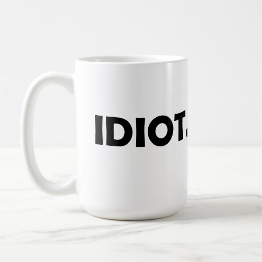 Idiot. Fantastisches Design Kaffeetasse (Links)