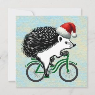 Igel, der mit dem Fahrrad Weihnachtsmannmütze fähr Feiertagskarte