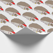 Igel zu Weihnachten in einer Weihnachtsmannmütze   Geschenkpapier (Ecke)