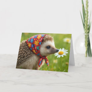 Igel zum Geburtstag, der eine Margerite beschnuppe Karte