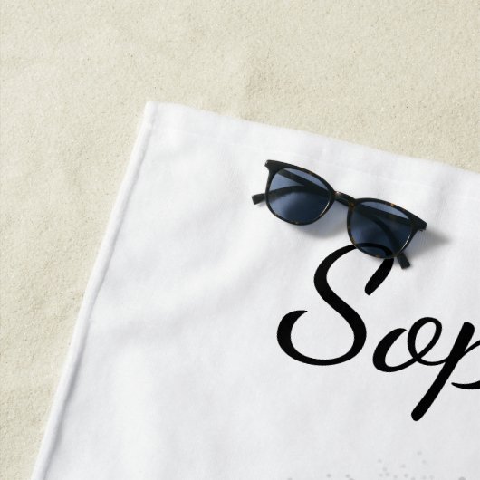 Ihr Foto und Ihre schwarzen Paws auf grauem und be Strandtuch (Beispiel)