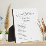 Ihr Sitzplatz wartet auf Hochzeitstisch mit Easel Fotoplatte<br><div class="desc">Fügen Sie Ihrem Hochzeitsempfang eine persönliche Touch mit dieser hübschen Tischplatte hinzu. Diese Plakette enthält die Worte "Ihr Sitzplatz wartet" in einem schönen Script-Schriftart, zusammen mit Ihrem Namen und Ihrem Hochzeitstag. Es ist mit einer einfachen Bedienung ausgestattet, die Ihnen die Anzeige auf Ihren Tischen oder an jedem anderen gewollt Ort...</div>