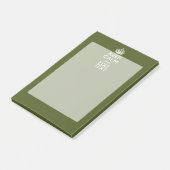 Ihr Text Behalte Ruhe und ist in einem grünen Oliv Post-it Klebezettel (angewinkelt)