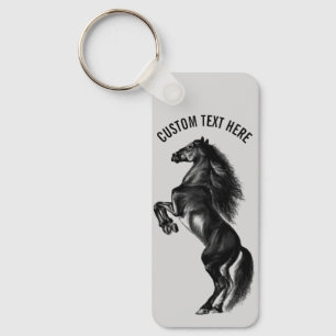 Ihr Text-Schlüsselanhänger mit dem aufrechten Schw Schlüsselanhänger