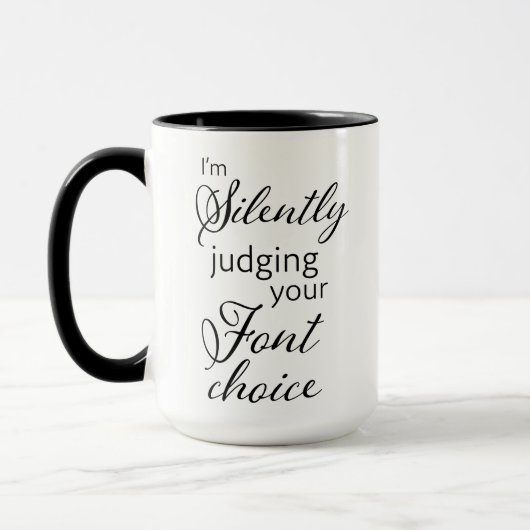 Ihre auserlesene Kaffee-Tasse des Schriftartes Tasse (Links)