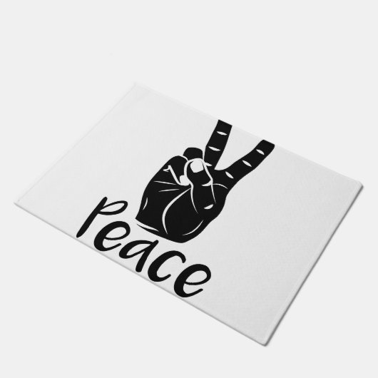 Ikonenhandfriedenszeichen mit Text "FRIEDEN" Fußmatte (Schrägansicht)