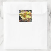 "il passaggio di fiori" quadratischer aufkleber (Tasche)