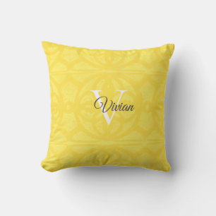 Illuminieren Gelbfarben-Batik-Monogramm-Name Kissen
