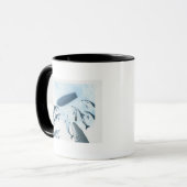 Illustration der Delphine, die oben einem Boot Tasse (Vorderseite Links)
