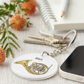 Illustration des französischen Horns von Cartoon Schlüsselanhänger (Vorderseite rechts)