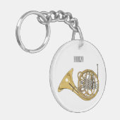 Illustration des französischen Horns von Cartoon Schlüsselanhänger (Vorderseite links)