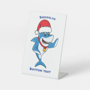 Illustration des Weihnachtshais-Cartoon Sockelschild