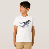 Illustration eines Raptor Dinosauriers, der Fußbal T-Shirt (Vorne ganz)