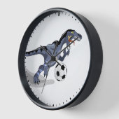Illustration eines Raptor Dinosauriers, der Fußbal Uhr (Winkel)
