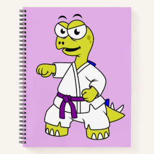 Illustration eines Stegosaurus, der Karate praktiz Notizblock