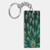 Illustration mit Pfau-Federn auf Schwarzem Schlüsselanhänger (Vorderseite links)