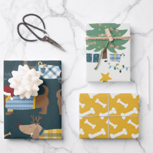 Illustration über niedliche Weihnachtskostüme und  Geschenkpapier Set