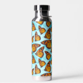 Illustrierte Monarchschmetterlinge auf Aqua Clouds Trinkflasche (Links)