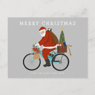 Illustrierter Weihnachtsmann - Fahrradfahren nach Feiertagspostkarte
