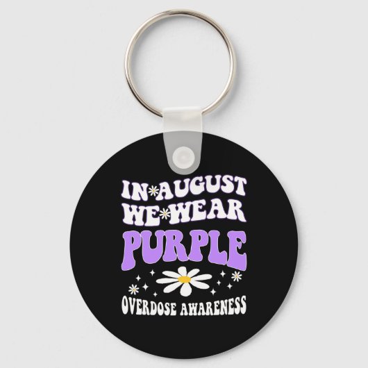 Im August tragen wir eine Lila Überdosierung Schlüsselanhänger (Vorderseite)