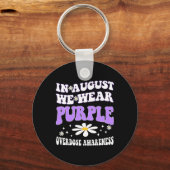 Im August tragen wir eine Lila Überdosierung Schlüsselanhänger (Vorderseite)