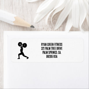 Im Fitnessraum Personal Trainer