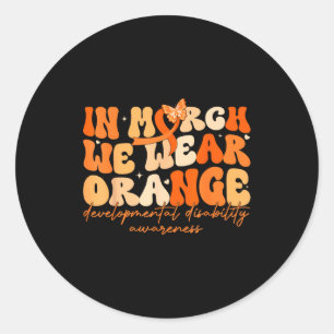 Im März tragen wir orange Entwicklungsstörung Runder Aufkleber
