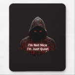 I'm Not Nice Mousepad<br><div class="desc">Make a bold statement without saying a word. This design features a dark, hooded cyber assassin with glowing red circuit runes and the striking quote: "I'm Not Nice I'm Just Quiet." It’s a perfect mix of cyberpunk aesthetics and a gritty, introverted attitude. Designed for those who appreciate minimalist techwear, dark...</div>