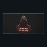 I'm Not Nice Schreibtischunterlage<br><div class="desc">Make a bold statement without saying a word. This design features a dark, hooded cyber assassin with glowing red circuit runes and the striking quote: "I'm Not Nice I'm Just Quiet." It’s a perfect mix of cyberpunk aesthetics and a gritty, introverted attitude. Designed for those who appreciate minimalist techwear, dark...</div>