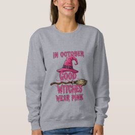 Im Oktober tragen gute Hexen rosa Sweatshirt