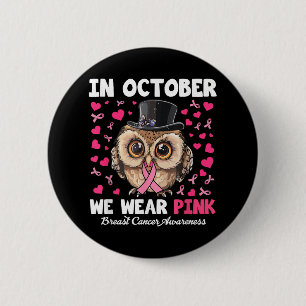 Im Oktober tragen wir ein pinkfarbenes Brustkrebs- Button