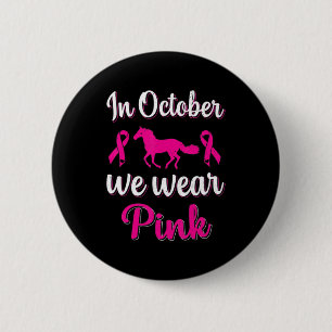 Im Oktober tragen wir ein pinkfarbenes Brustkrebsb Button