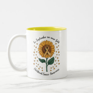 Im September tragen wir Gold Kindheitskrebsbewusst Zweifarbige Tasse
