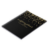 Imitat-GoldConfetti auf Schwarzem | irgendein Notizblock (Linke Seite)