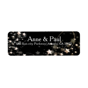 Imitat-Goldconfetti-Sterne auf schwarzem modernem