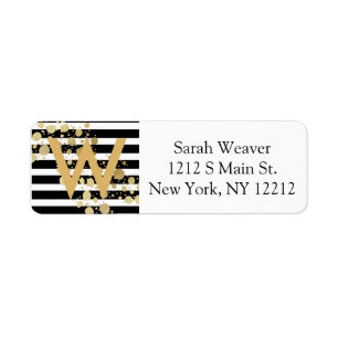 Imitat-Goldfarben-Spritzer auf den schwarzen u.