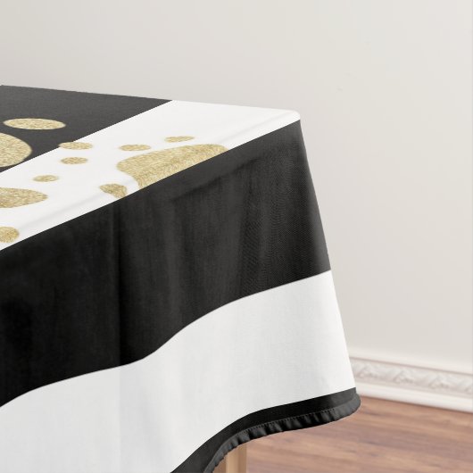 Imitat-Goldfarben-Spritzer auf den schwarzen u. Tischdecke (Beispiel)