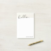Imitat-Goldpunkte mit "hallo" in der schwarzen Post-it Klebezettel (Auf Schreibtisch)